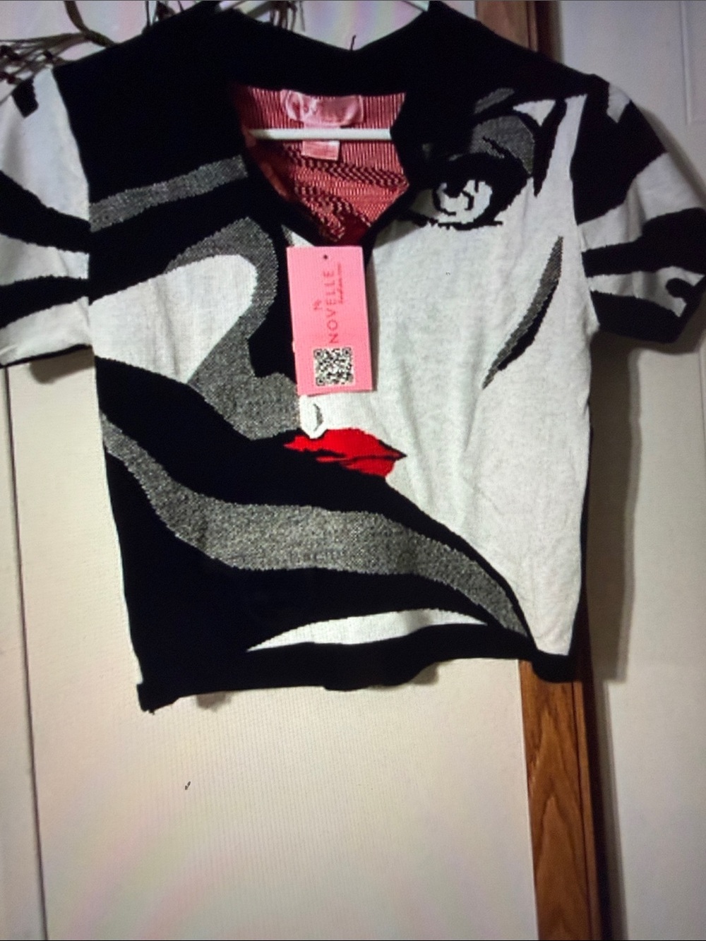Nouvelle fashion inc Black & White Short Sleeve Graphic Knit Top with Red Accent